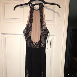 Black halter prom dress with lace accents